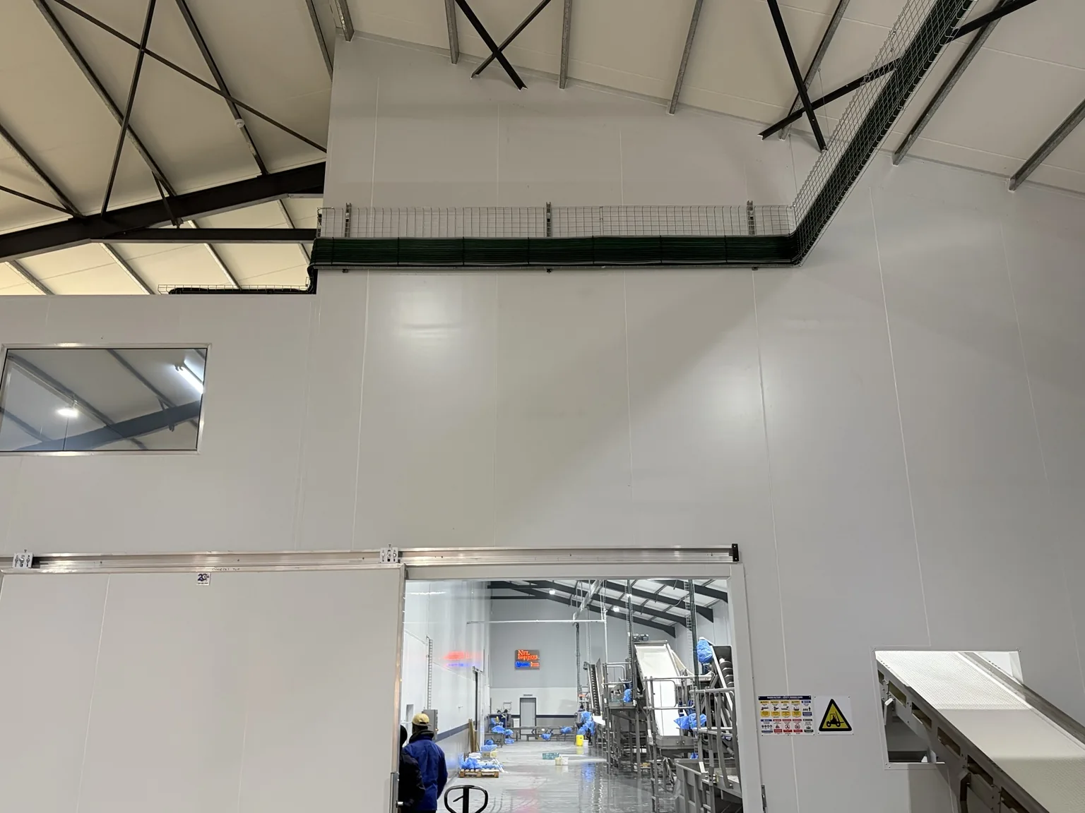 Industrial cabling routed into a production area